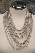 NU funky raw beige leather multi string necklace.215 Was 65 now...