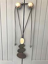 Four black wood disc necklace.ANG1