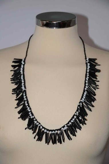 Black hanging bead necklace.25