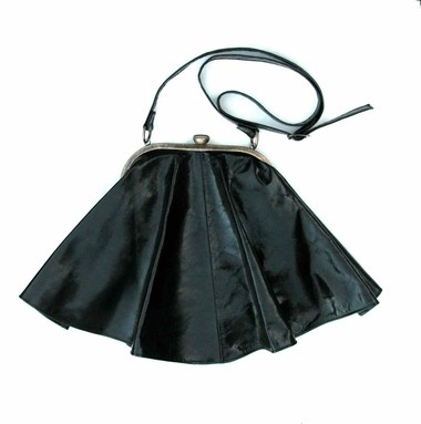 (A1) black skirt bag. 